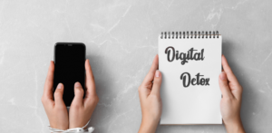 Digital detox image with phone and notepad
